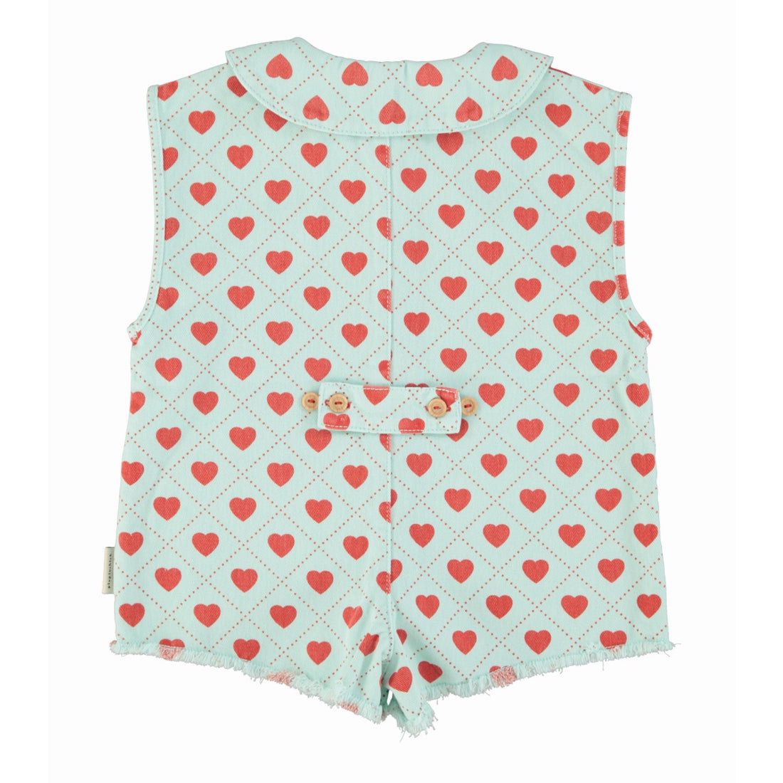 Children's jumpsuit with red heart pattern on a light blue background