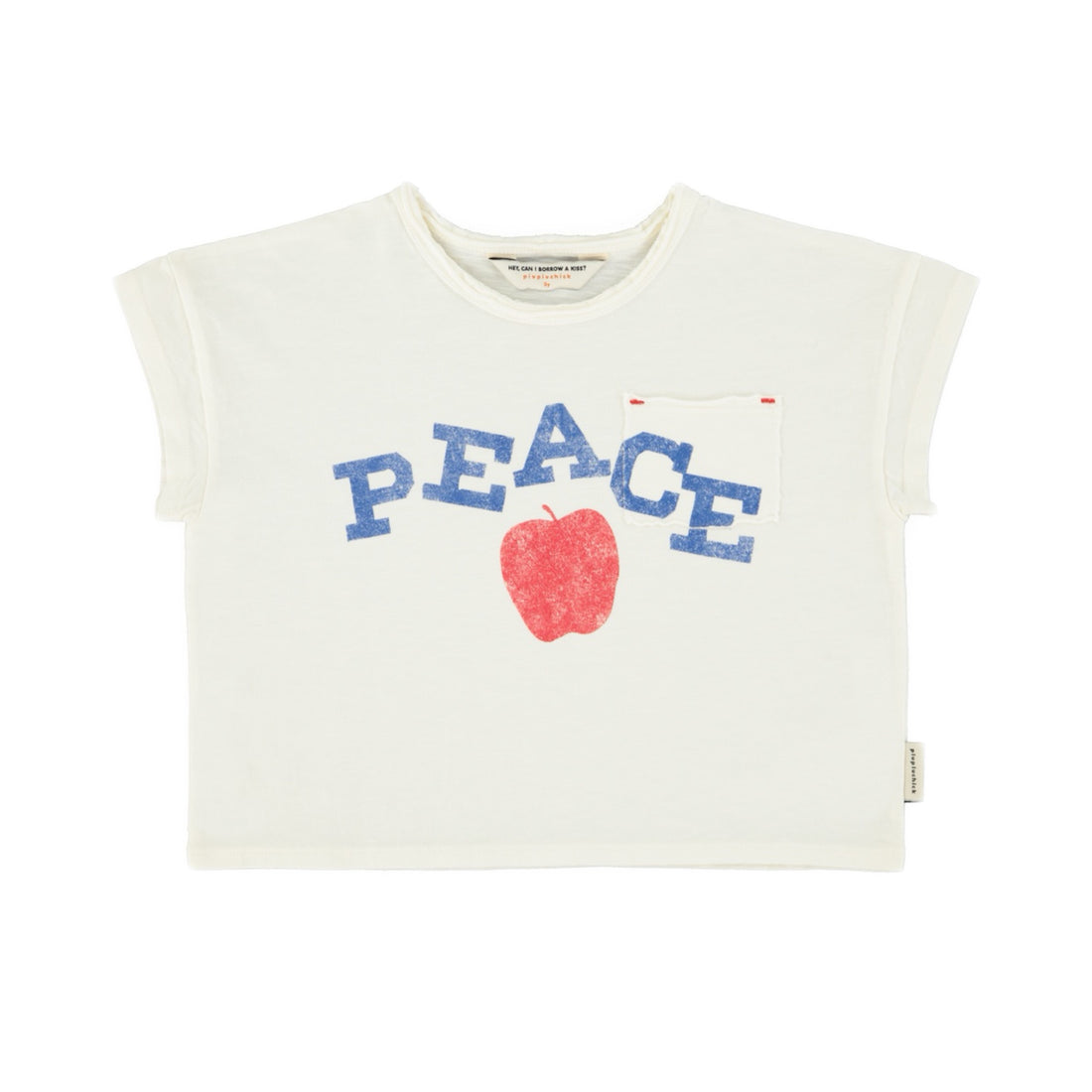 White sleeveless top with 'PEACE' and an apple graphic 