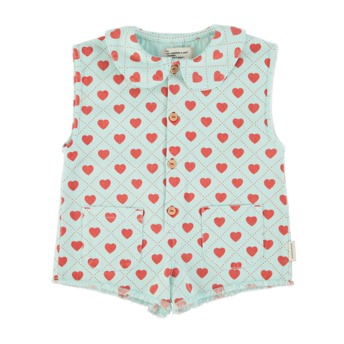 Children's jumpsuit with red heart pattern on a light blue background