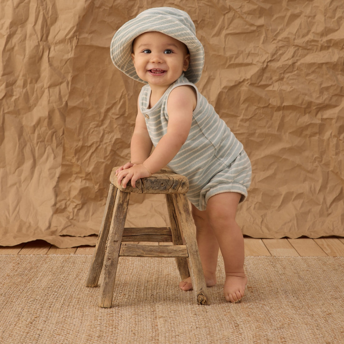 Blue and white striped tank top and shorts set with button
