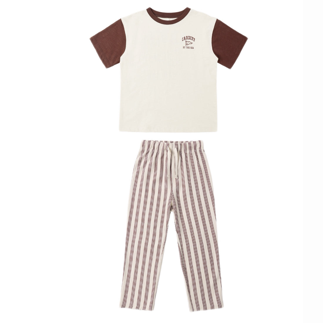 Children's set with a white short sleeve top with brown sleeves, paired with striped brown and white pants .
